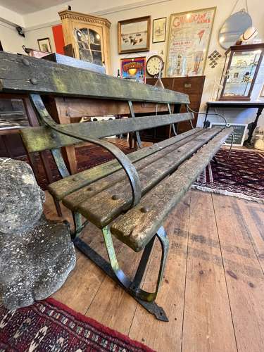 Wrought iron and wood garden bench