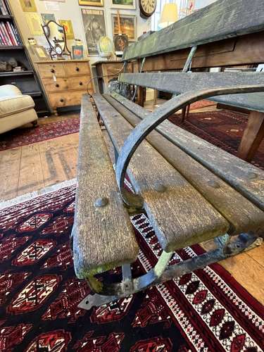 Wrought iron and wood garden bench