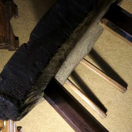 Bog oak stool in the style of a small pig bench