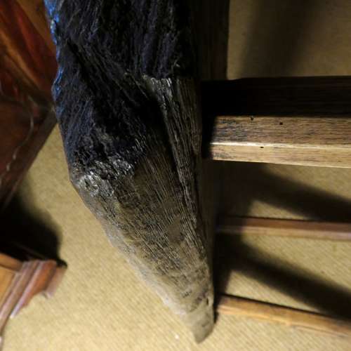 Bog oak stool in the style of a small pig bench