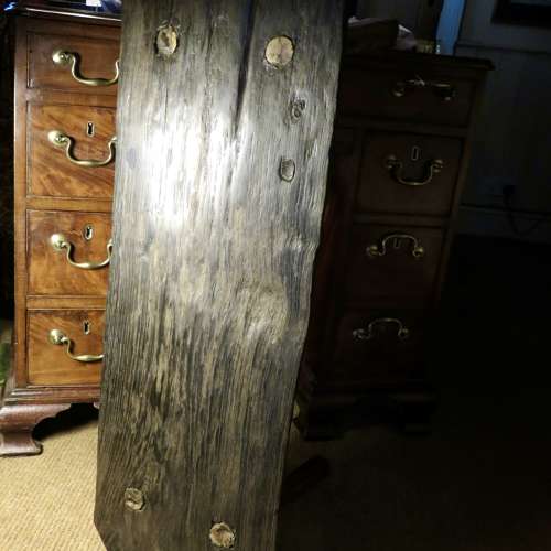 Bog oak stool in the style of a small pig bench