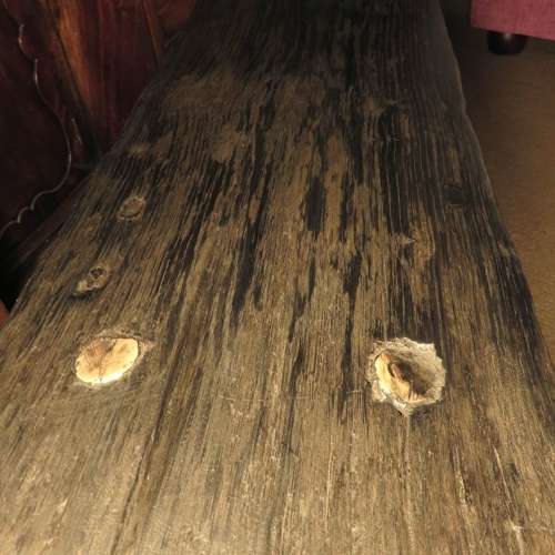 Bog oak stool in the style of a small pig bench