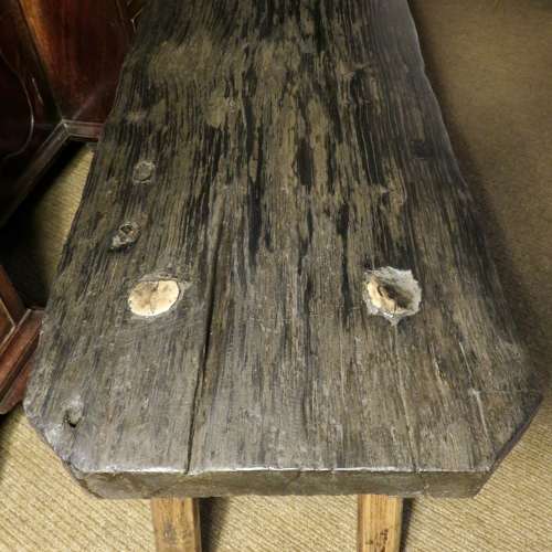 Bog oak stool in the style of a small pig bench