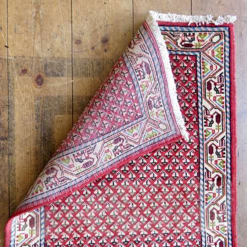 Small handknotted Persian rug