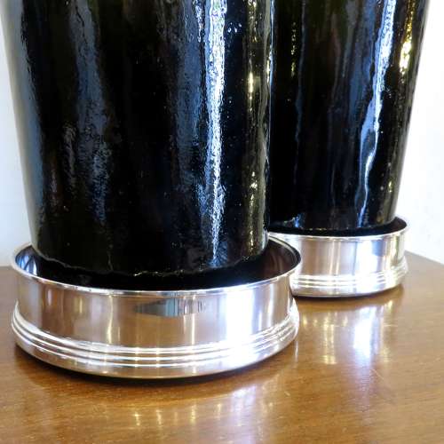 Pair of silver bottle coasters, in their boxes