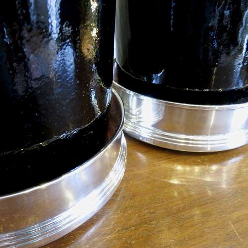 Pair of silver bottle coasters, in their boxes