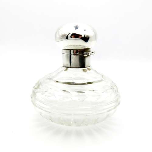 Silver and Glass round perfume bottle with stopper, 1924