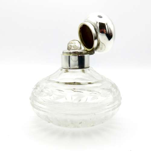 Silver and Glass round perfume bottle with stopper, 1924