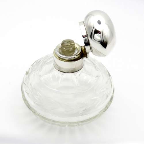 Silver and Glass round perfume bottle with stopper, 1924