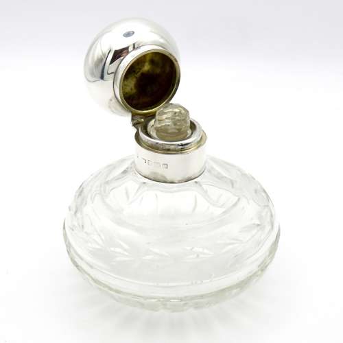 Silver and Glass round perfume bottle with stopper, 1924