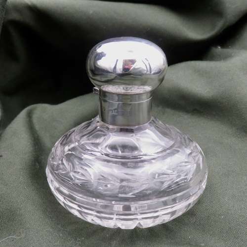 Silver and Glass round perfume bottle with stopper, 1924