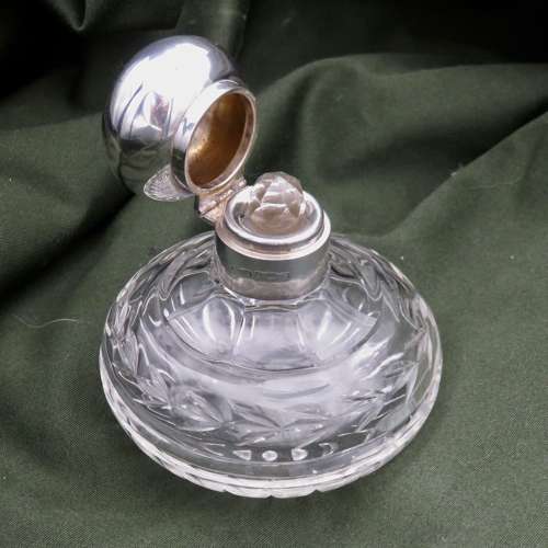 Silver and Glass round perfume bottle with stopper, 1924