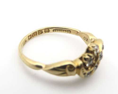 18ct Gold and Diamond cross-over ring Size J