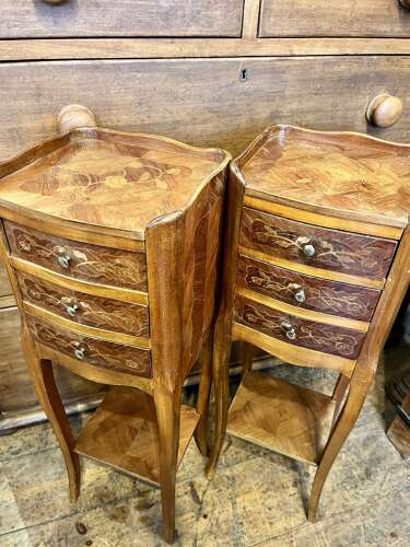 A pair of very small French bedside cabinets