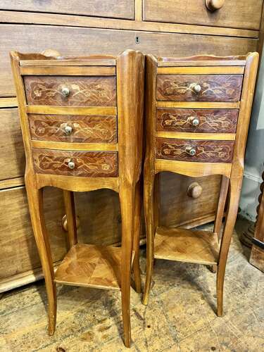 A pair of very small French bedside cabinets