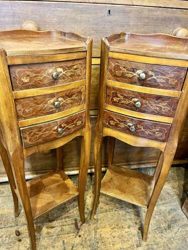 A pair of very small French bedside cabinets