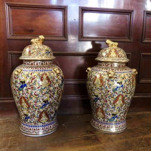 Pair of imposing decorative lidded urns