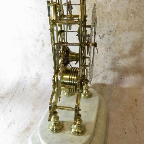 20thC Skeleton Clock in original glass dome