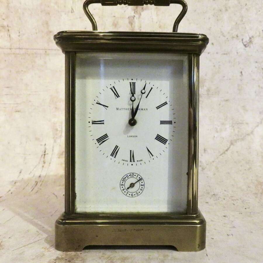 20thC brass carriage alarm clock by Mathew Norman